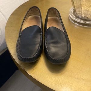 Black authentic Tod’s driving loafers.